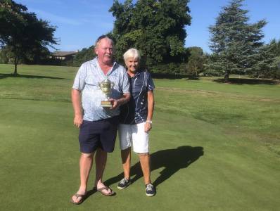 Winner of the Anchorage Wines Best Stableford Mike Inwood, with Best Ladies Stableford winner Yvonne Stevenson