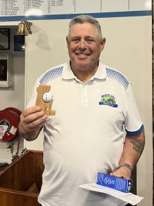 Chris Baker holding his trophy after acing hole 11 during the Friday Club on July 24th.